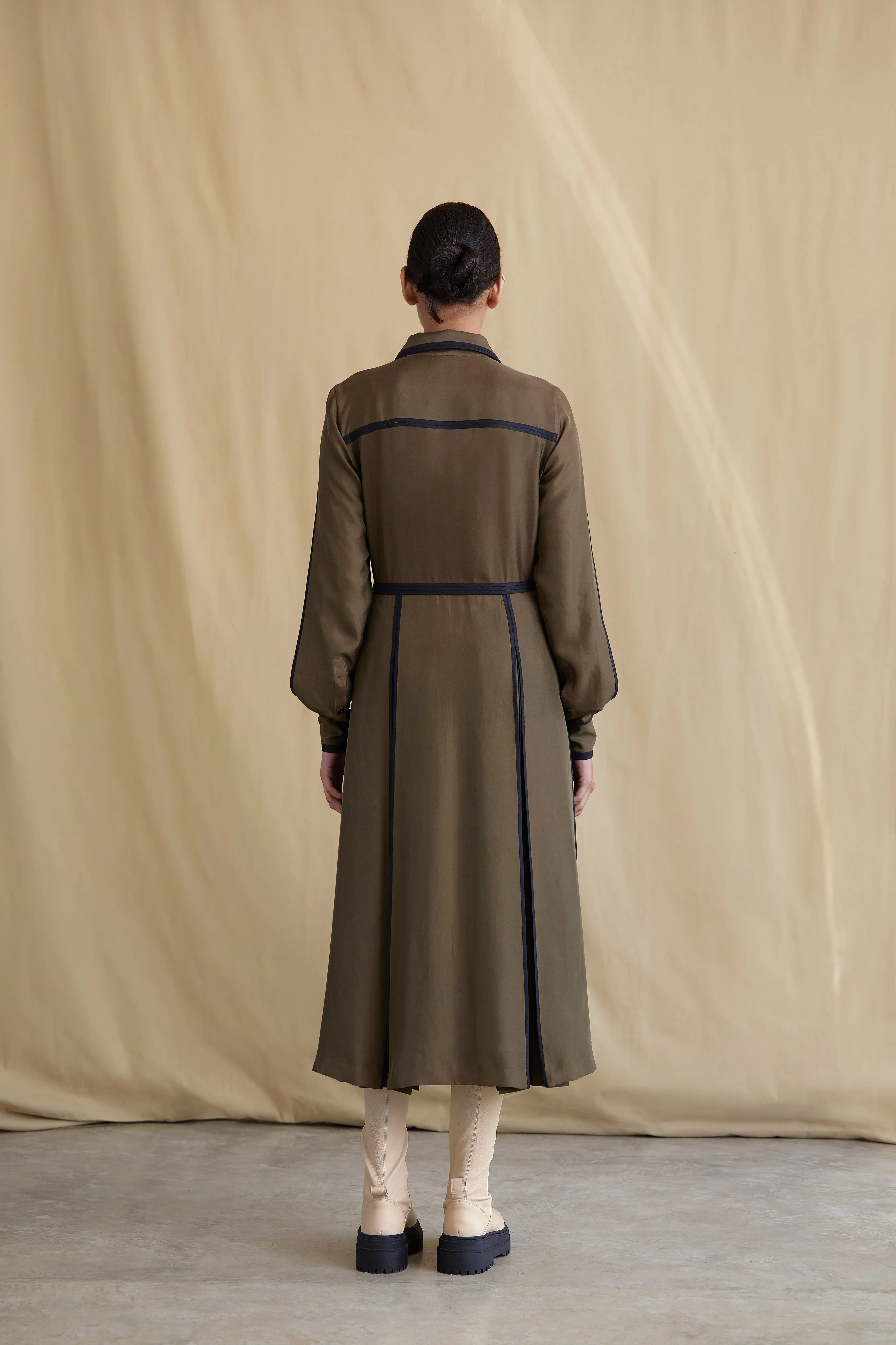Silk dress with partially opened pleats
